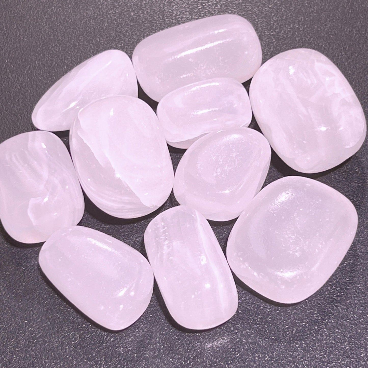 Pink Mangano Calcite Tumbled Stones (UV Reactive)(By The Piece Or Pound)