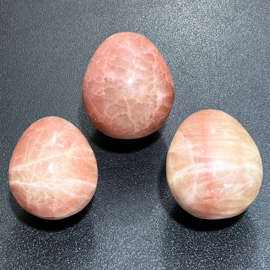 Rose Red Calcite Crystal Egg Polished Carving